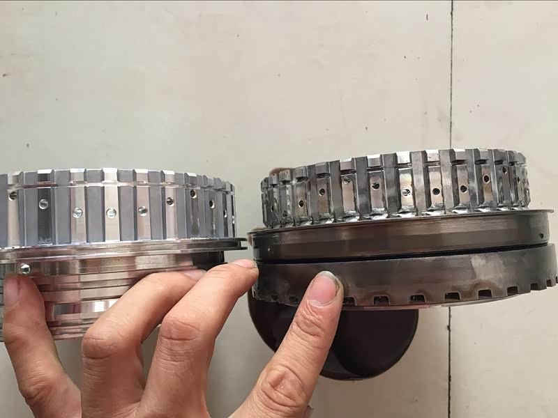 损坏的铝鼓和新的铝鼓的对比