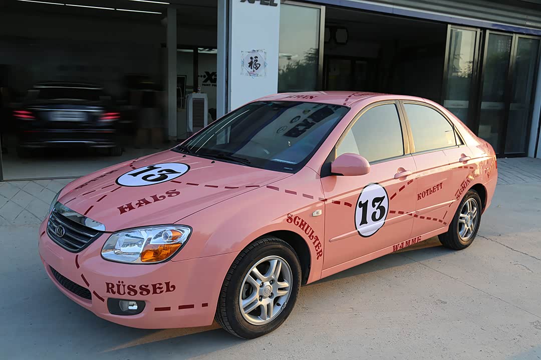 又一辆粉猪猪来了 !10年赛拉图全车改色贴膜保时捷同款