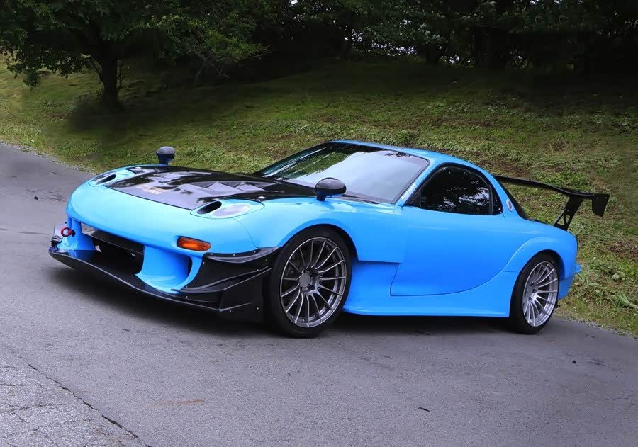 文章 马自达rx 7 Re雨宫1吨改装 改装基于rx 7 Fd3s 由re雨宫出品 搭载13b Rew转子涡轮增压发动机 输出约400马力 车身经轻量化 配碳纤维前盖 前唇 门板和尾翼等 车 重978千克 前后分配分别为533千克和445千克 W 车家号 汽车之家