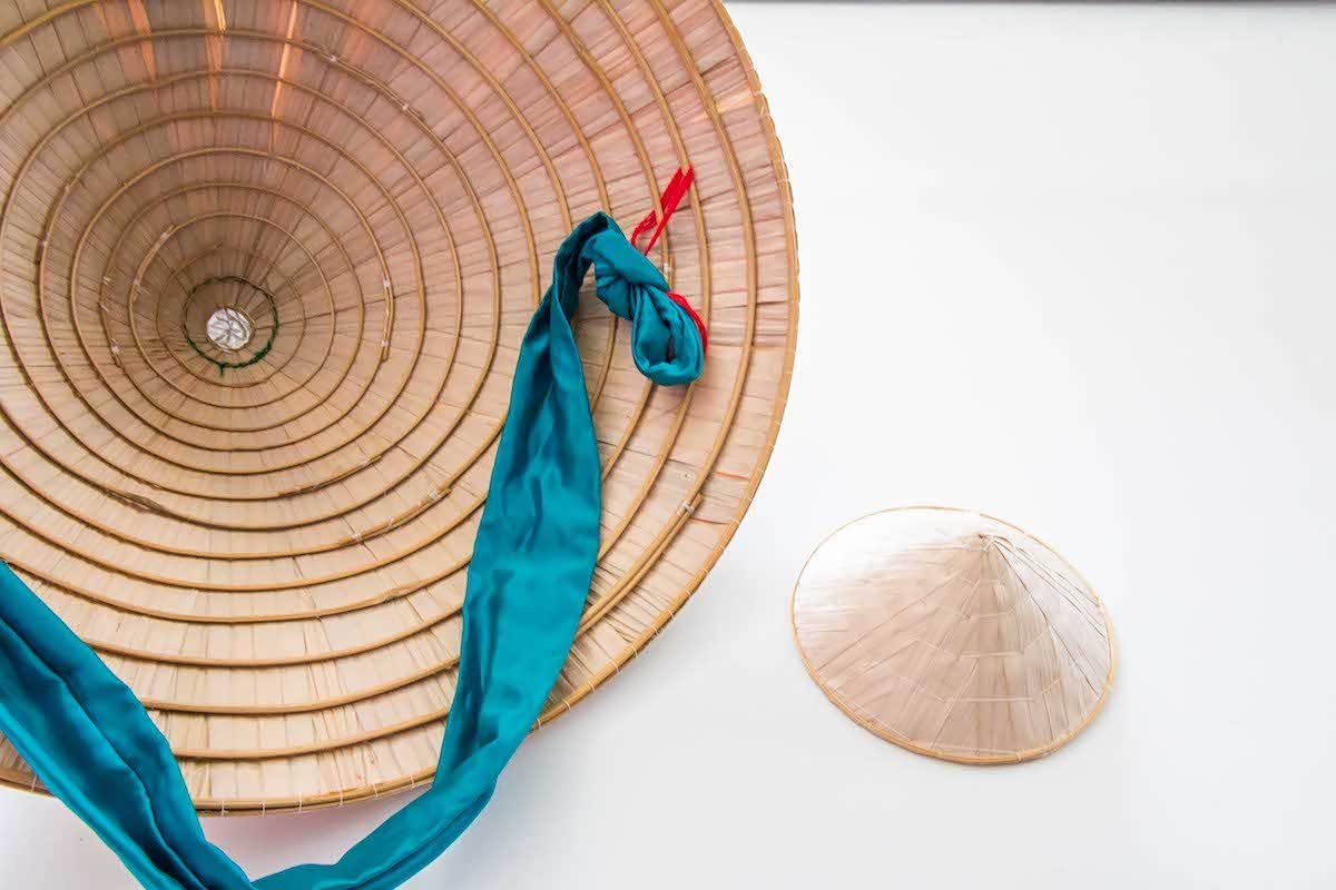 为什么越南女人喜欢戴圆锥形的帽子