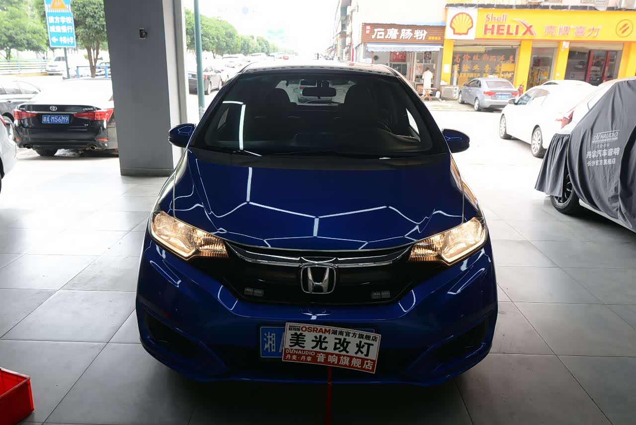 长沙本田飞度大灯经济实惠改装方案 升级gegn格界45w高亮透镜套装